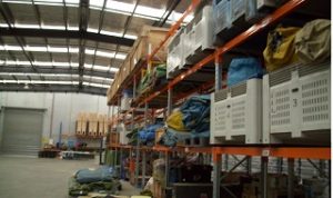 Racks filled with Camping Gear in large warehouse