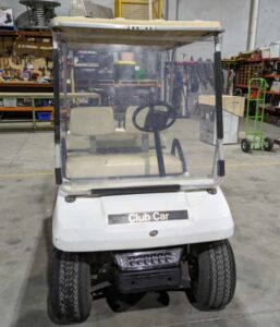 "Pud" the golf cart front view in Q Store warehouse
