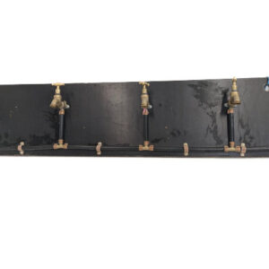 Wooden board with 4 interconnected brass taps
